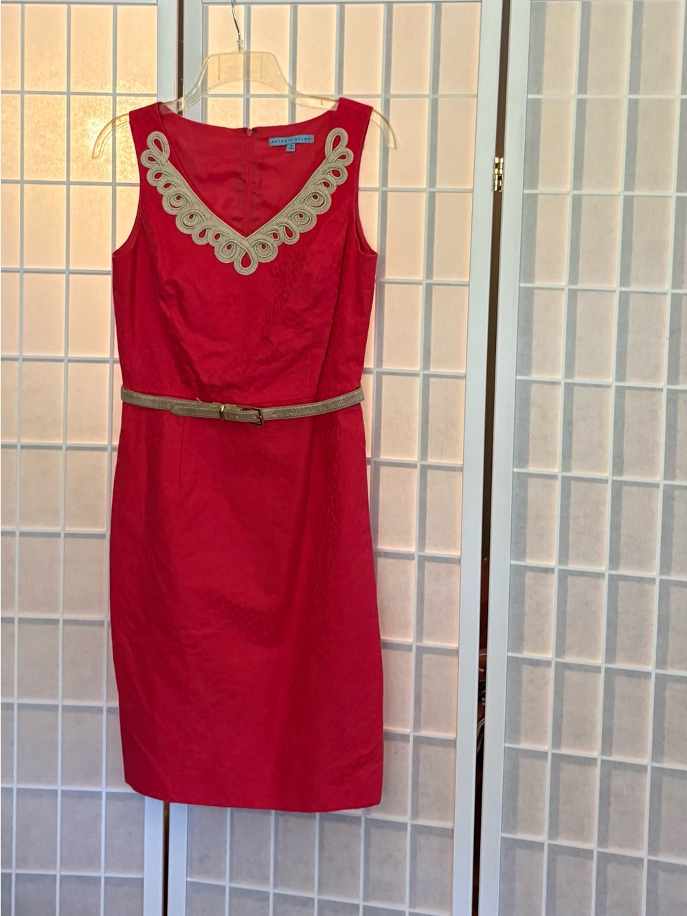Red Sleeveless Dress with Decorative Neckline and taupe Belt